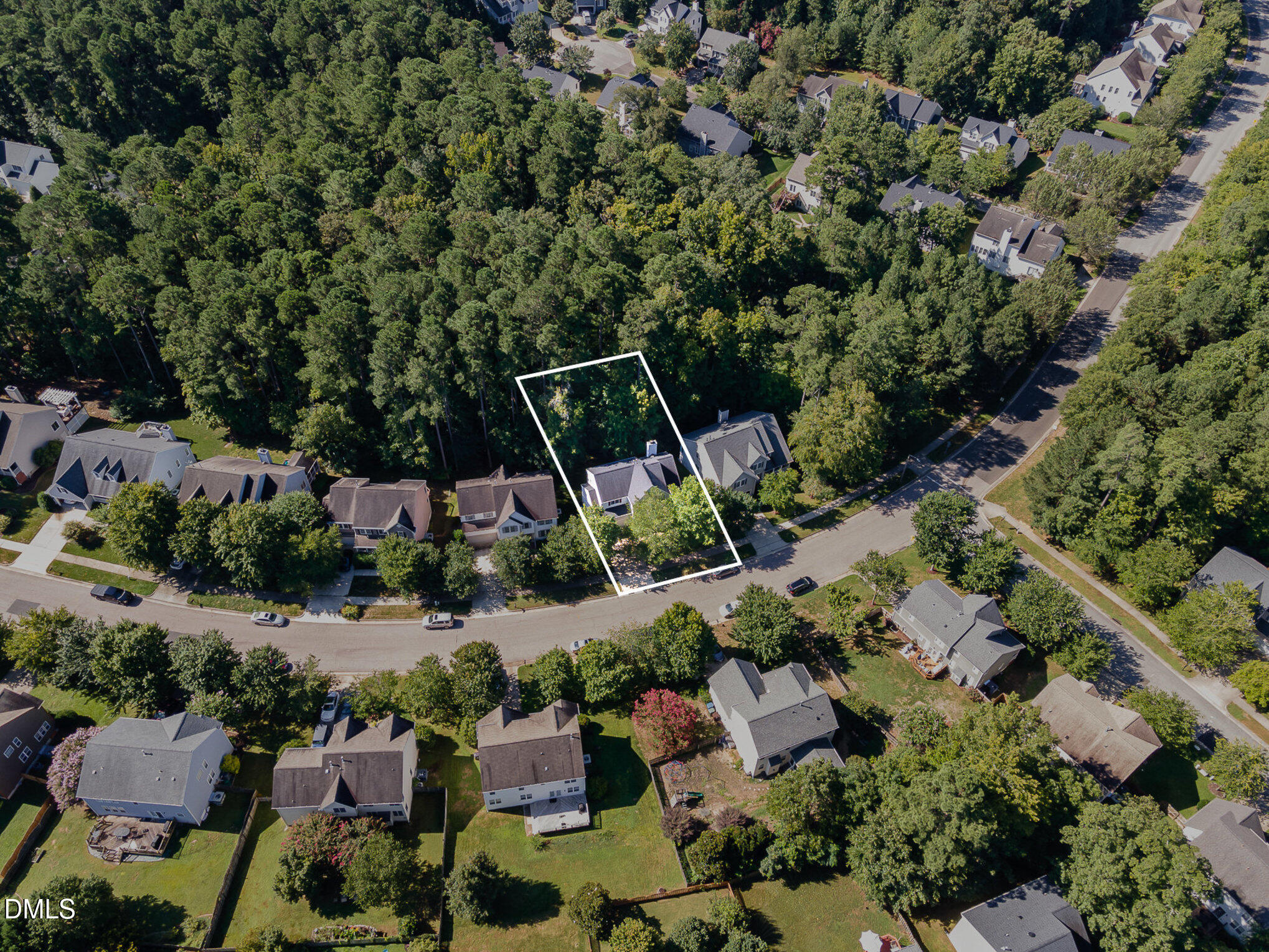 1004 Chancellors Ridge Drive Durham, NC 27713 - Photo 27 of 32 an aerial view of a house with a yard and lake view