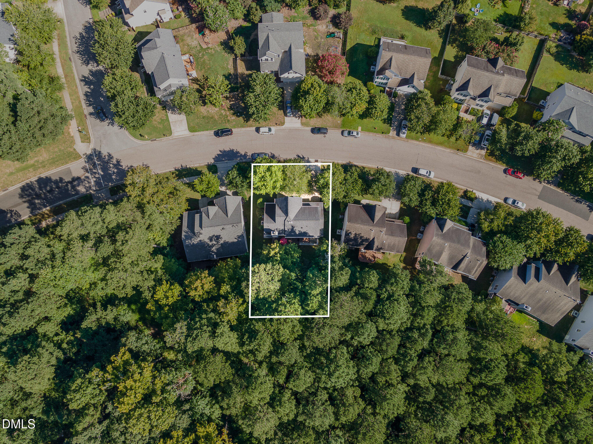 1004 Chancellors Ridge Drive Durham, NC 27713 - Photo 28 of 32 an aerial view of a house with yard outdoor seating and trees