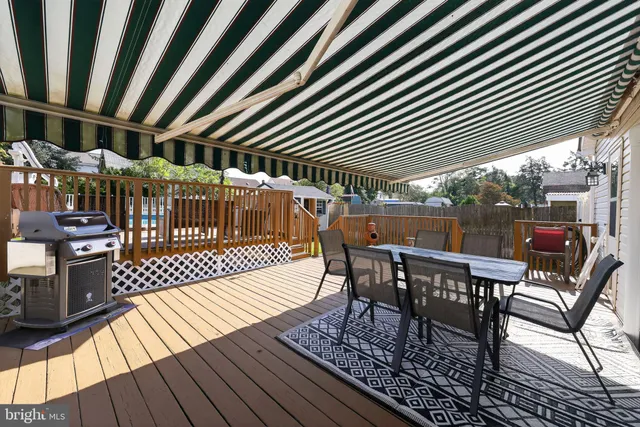 a view of a chairs with wooden floor