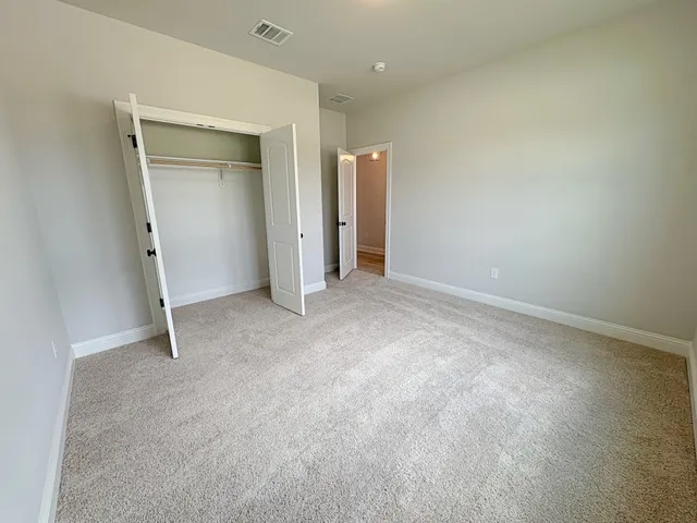 an empty room with closet