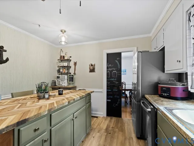 a view of an empty room with glass door