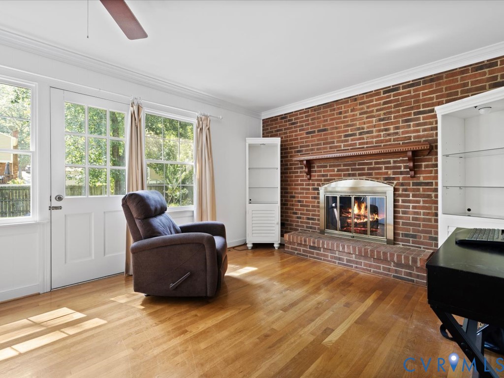 222 Homestead Drive Colonial Heights, VA 23834 - Photo 14 of 35 a living room with furniture and a fireplace