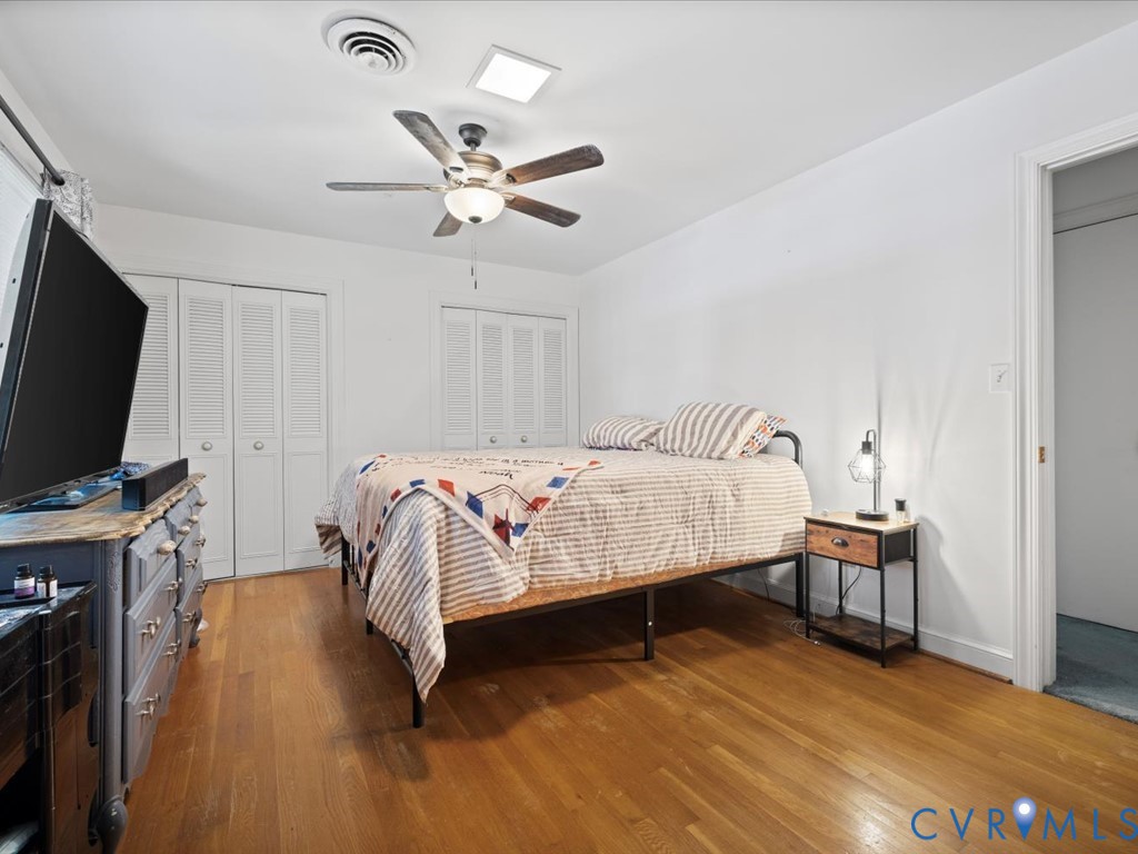 222 Homestead Drive Colonial Heights, VA 23834 - Photo 19 of 35 a bedroom with a bed and flat screen tv