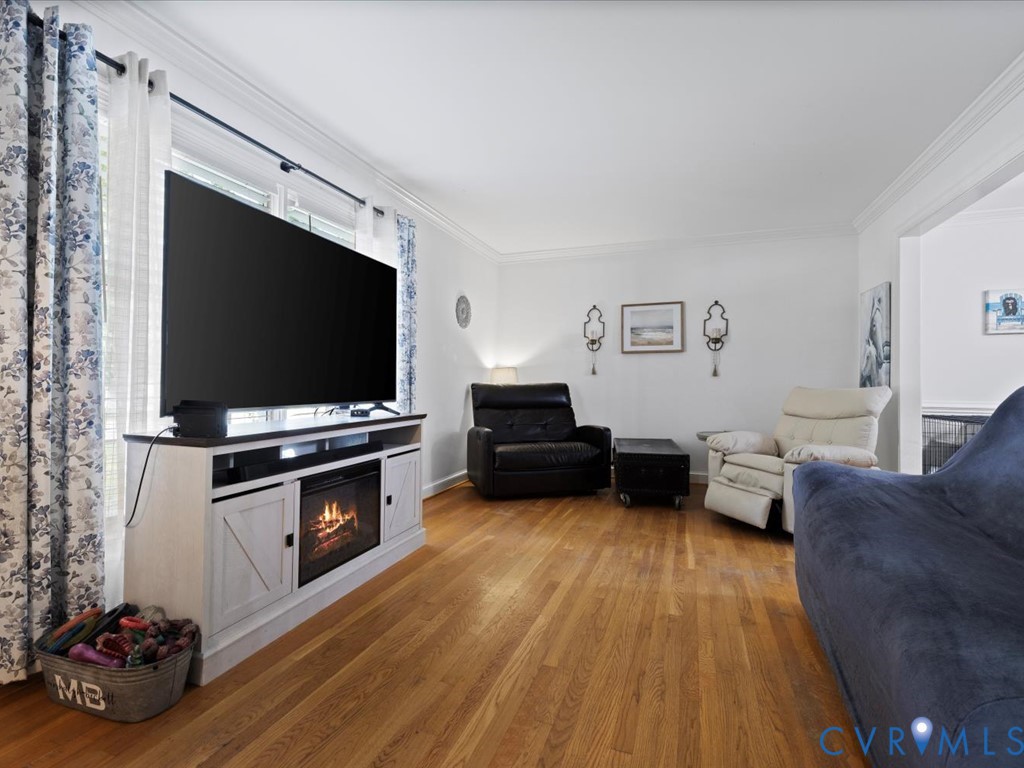 222 Homestead Drive Colonial Heights, VA 23834 - Photo 7 of 35 a living room with furniture and a flat screen tv