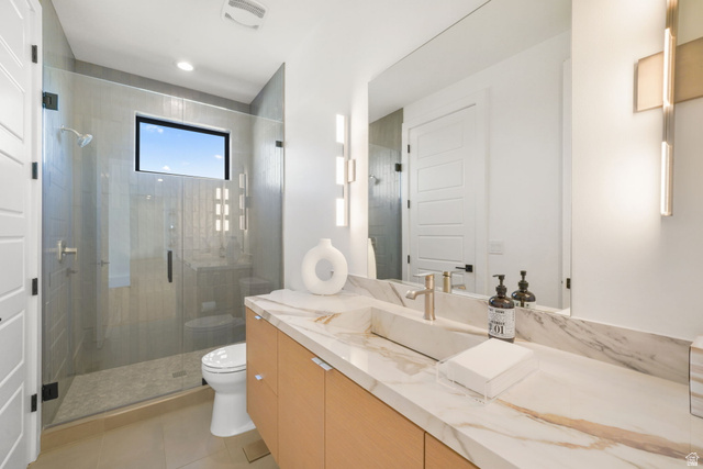 3667 Little Cottonwood Road, Unit 1 Sandy, UT 84092 - Photo 25 of 49 Modern bathroom featuring a spacious glass-enclosed shower with a rectangular window, a light wood-finish vanity with ample storage, a stone-finish countertop, a rectangular vessel sink, and a large wall-mounted mirror with integrated lighting