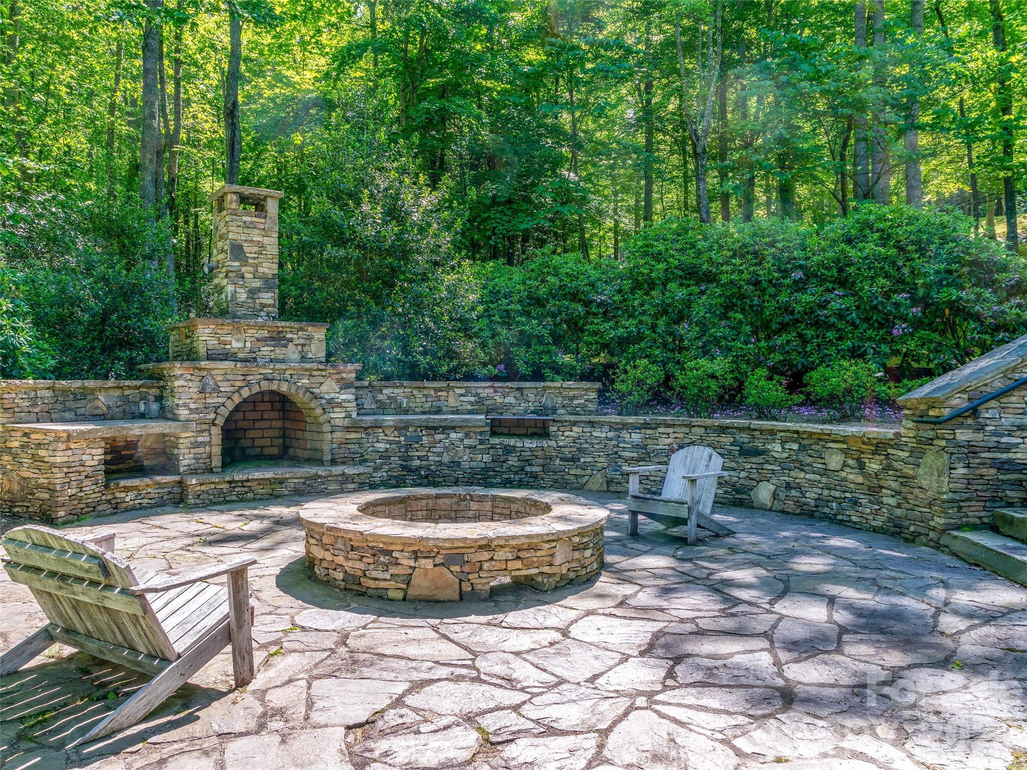 42 Hickory Springs Road, Unit 42 Burnsville, NC 28714 - Photo 26 of 35 a view of a swimming pool with a patio