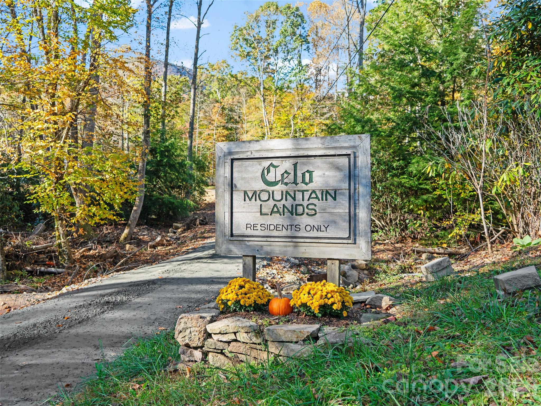 42 Hickory Springs Road, Unit 42 Burnsville, NC 28714 - Photo 35 of 35 a sign on the side of the road