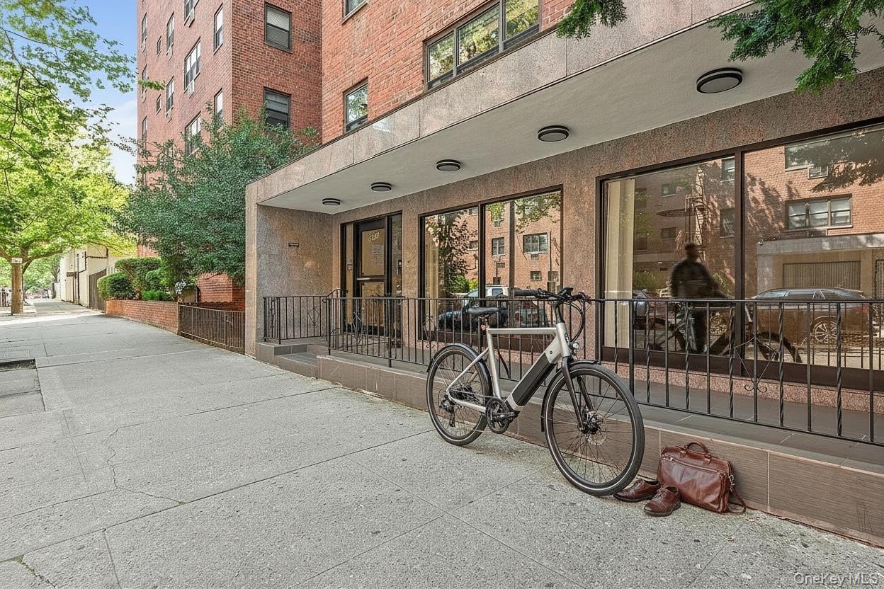99-10 60th Avenue, Unit 5D Queens, NY 11368 - Photo 7 of 9 a view of a patio with table and chairs
