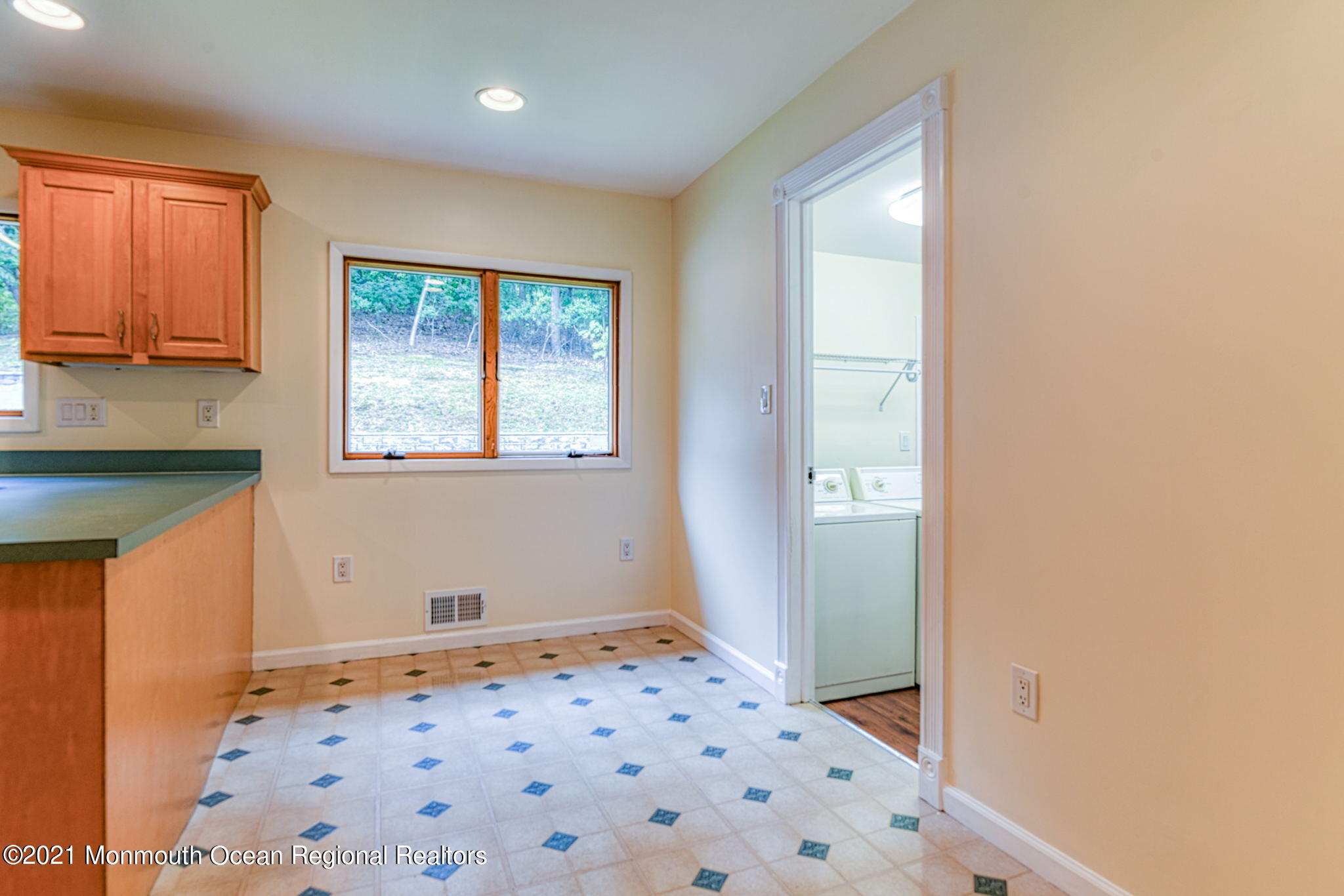 56 Newbury Road Howell, NJ 07731 - Photo 14 of 32 a view of a room with wooden floor and a window
