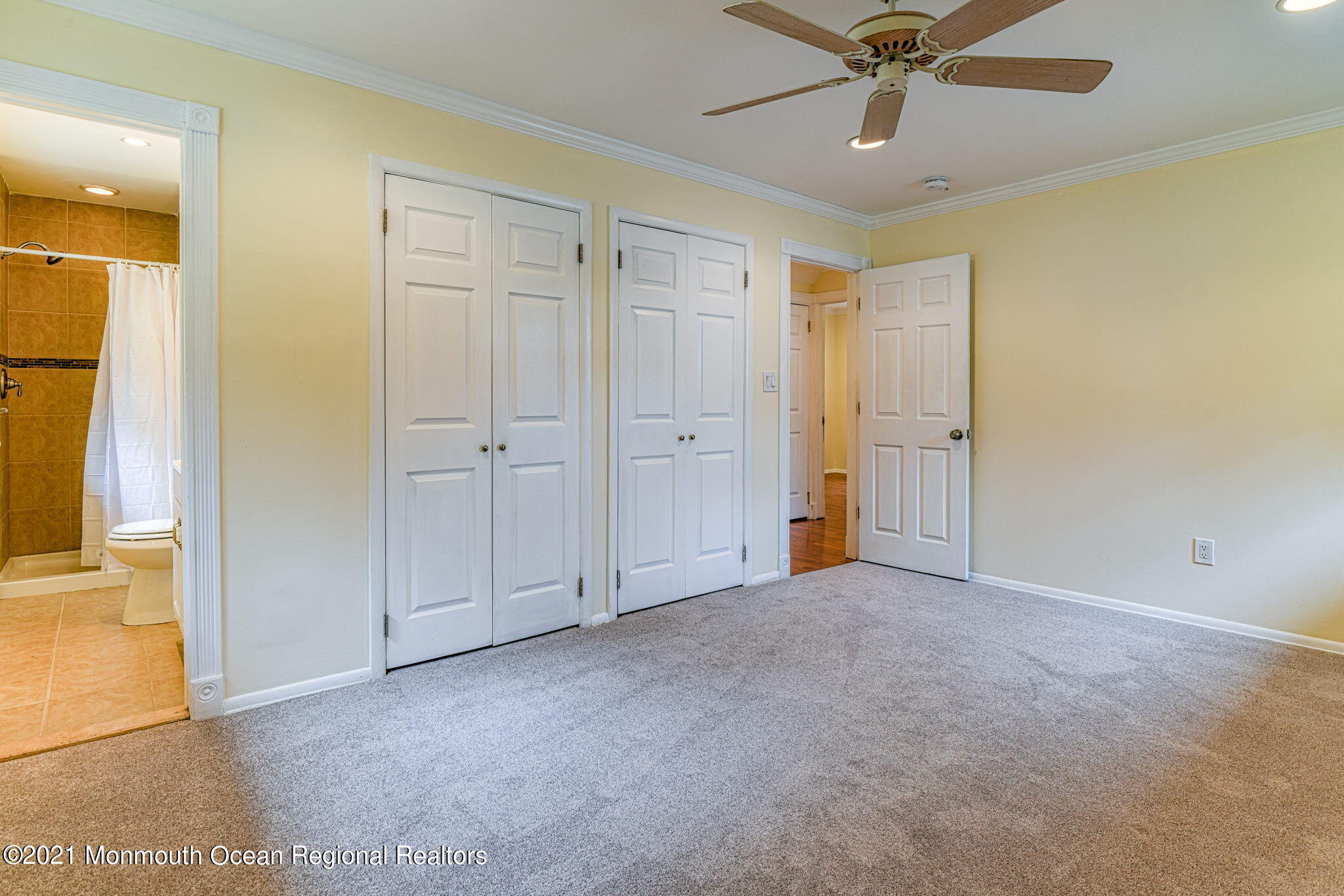 56 Newbury Road Howell, NJ 07731 - Photo 16 of 32 an empty room with a ceiling fan