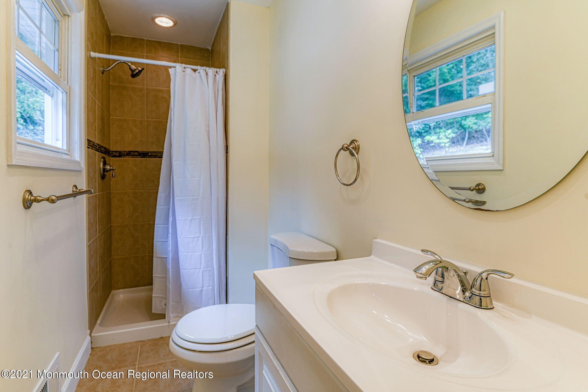 56 Newbury Road Howell, NJ 07731 - Photo 17 of 32 a bathroom with a sink toilet and shower