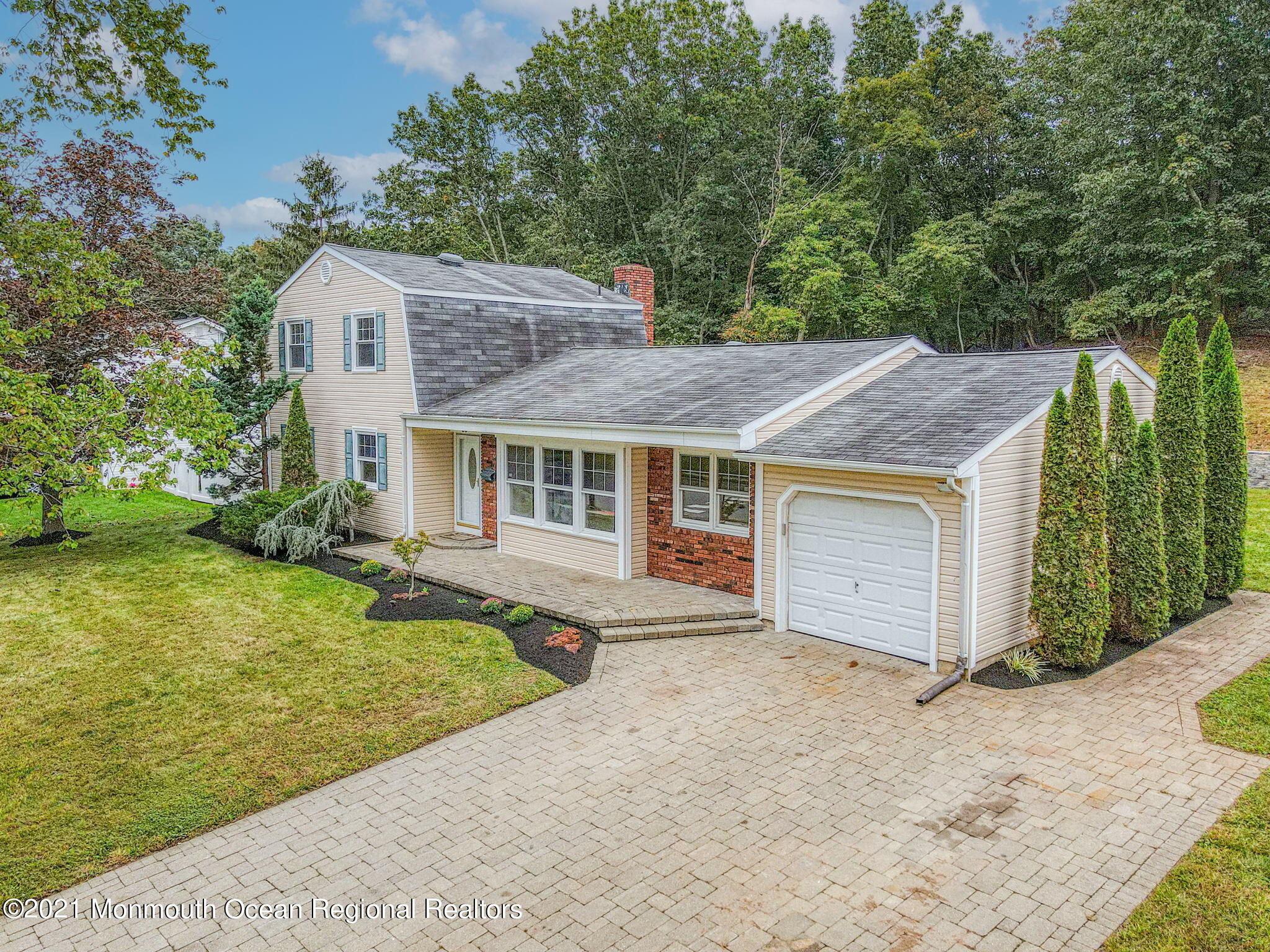 56 Newbury Road Howell, NJ 07731 - Photo 3 of 32 a view of a house with backyard and garden