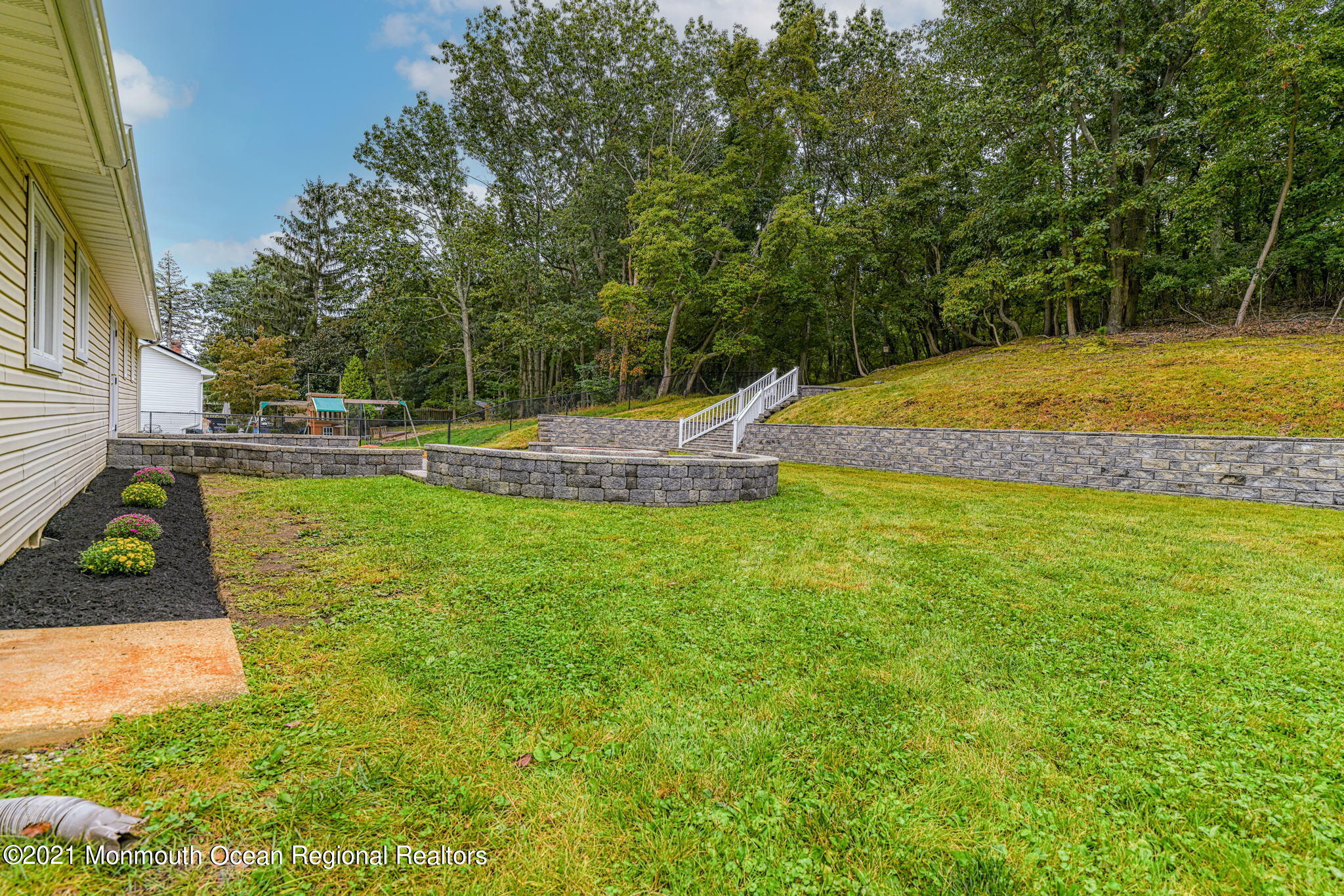 56 Newbury Road Howell, NJ 07731 - Photo 26 of 32 a view of a backyard with a swimming pool