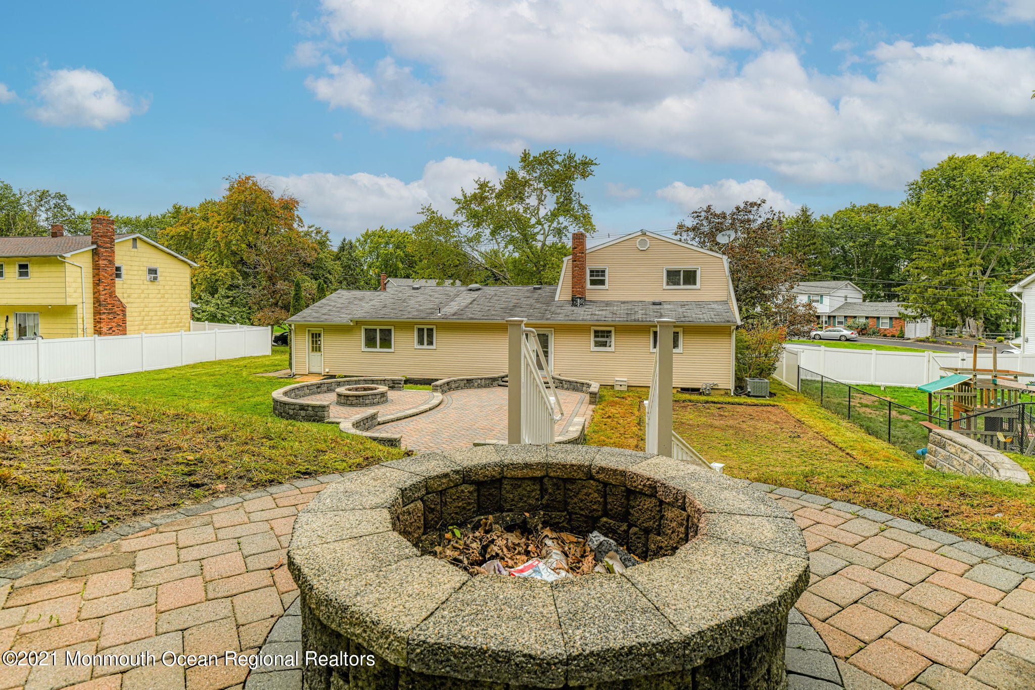 56 Newbury Road Howell, NJ 07731 - Photo 29 of 32 a view of a swimming pool with a patio