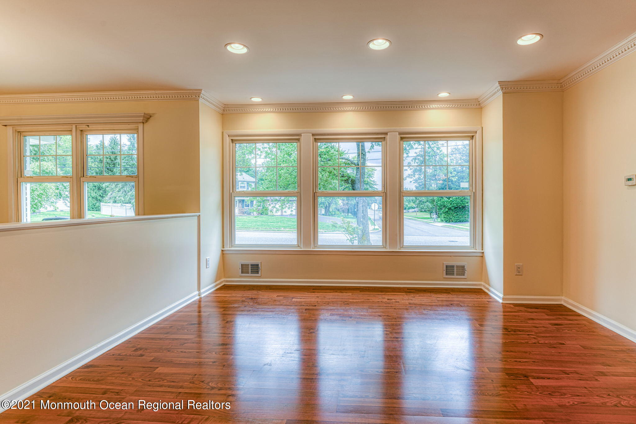 56 Newbury Road Howell, NJ 07731 - Photo 4 of 32 a view of room with window and wooden floor
