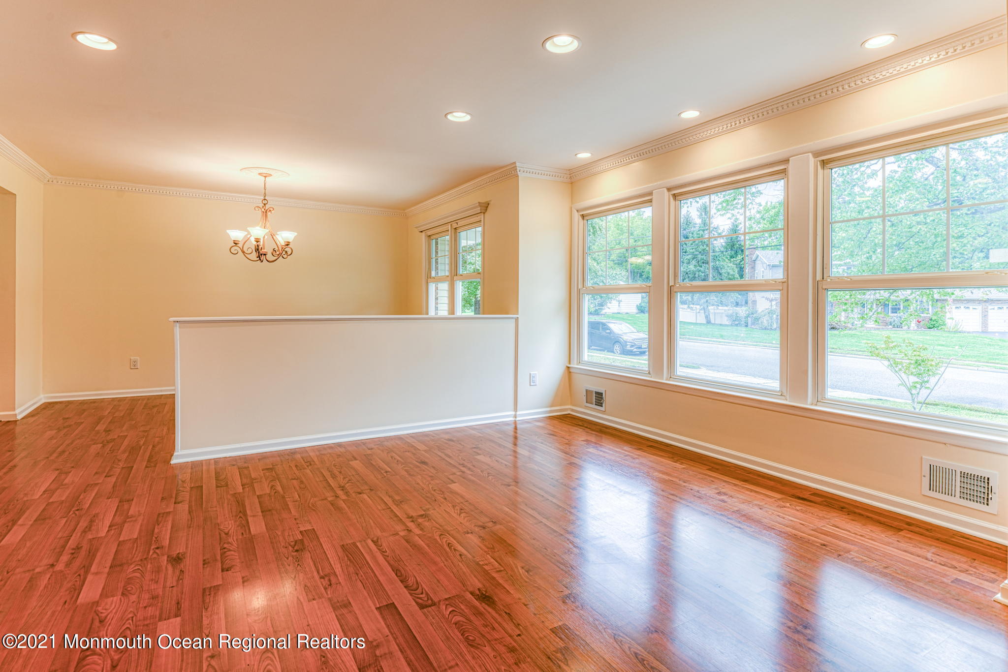 56 Newbury Road Howell, NJ 07731 - Photo 5 of 32 a view of an empty room with wooden floor and a window