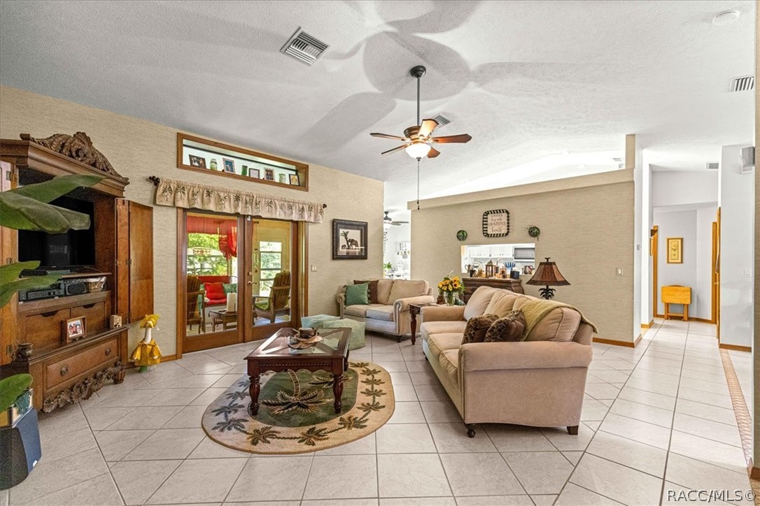 2964 South Cygnet Terrace Inverness, FL 34450 - Photo 8 of 67 a living room with furniture and a flat screen tv
