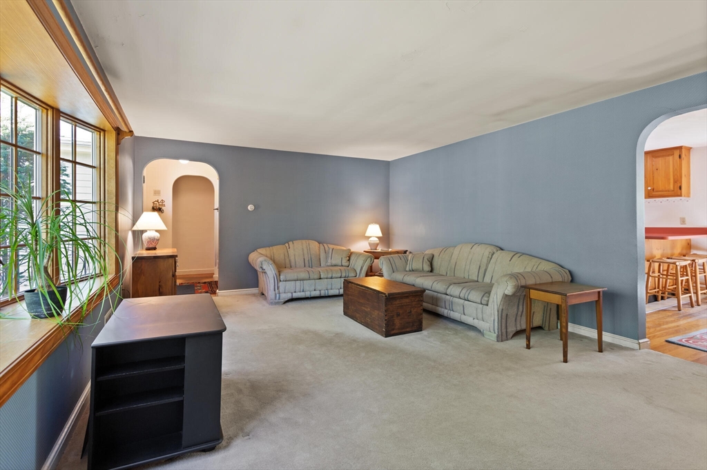 33 Pope Road Acton, MA 01720 - Photo 6 of 30 a living room with furniture and a window