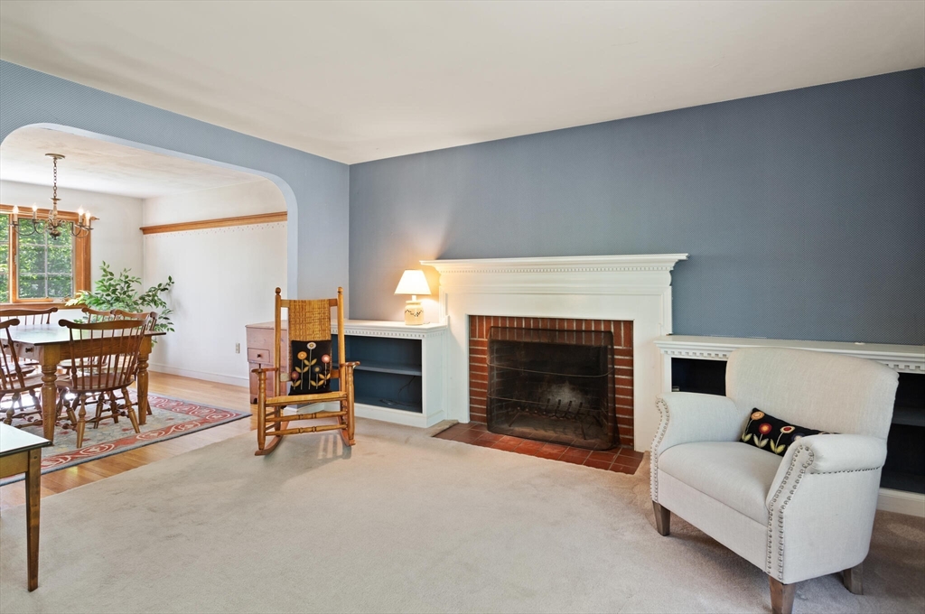 33 Pope Road Acton, MA 01720 - Photo 8 of 30 a living room with furniture and a fireplace