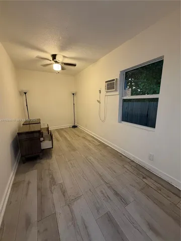 a view of a livingroom with a flat screen tv