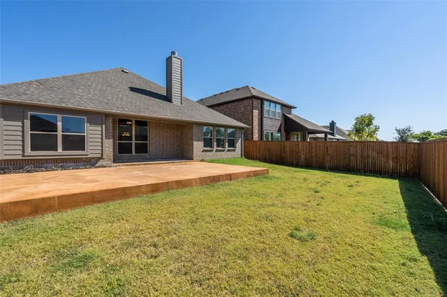 a front view of a house with yard
