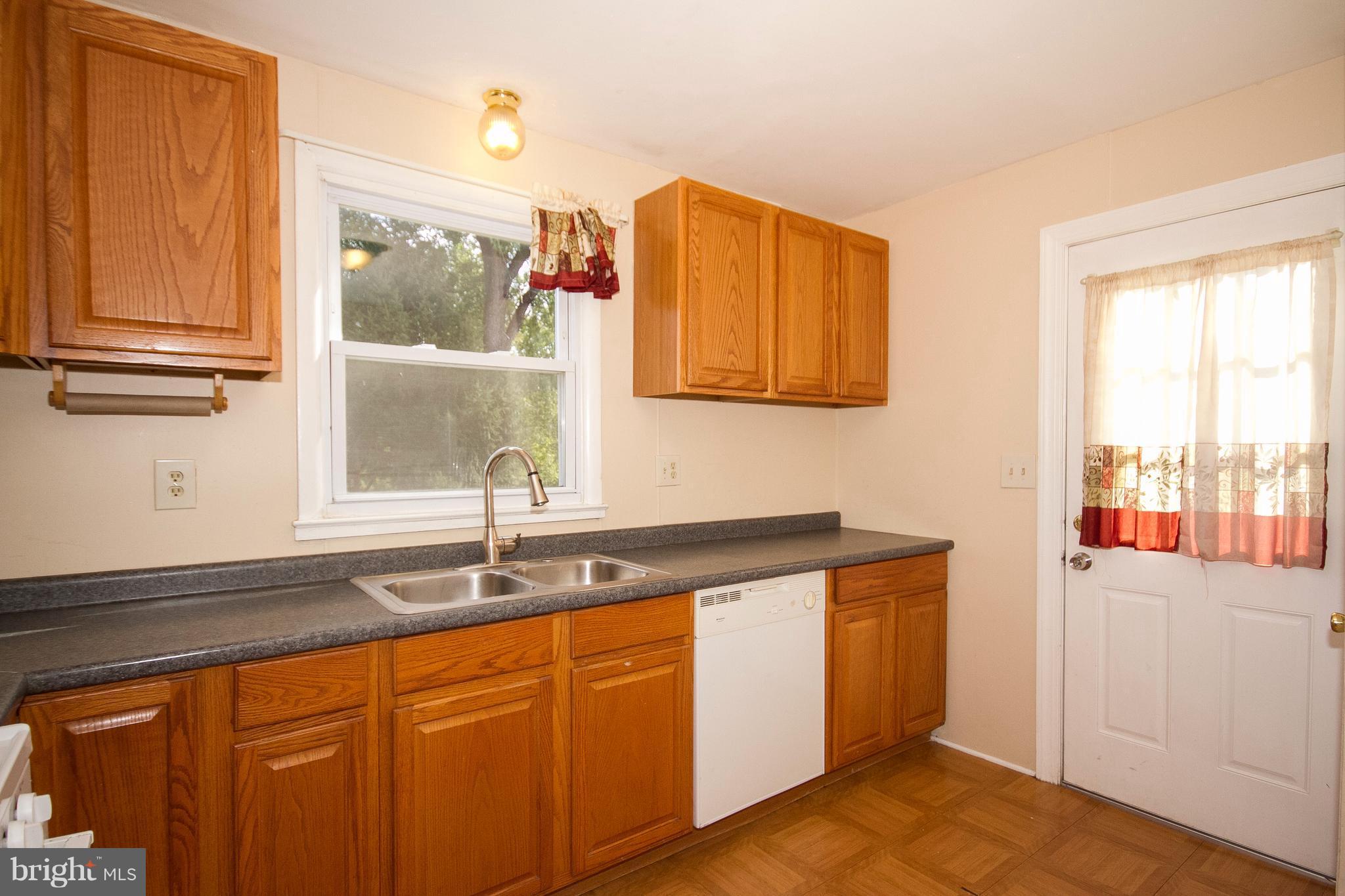 7003 Gaymount Road Baltimore, MD 21244 - Photo 5 of 18 Kitchen Overlooking the Backyard