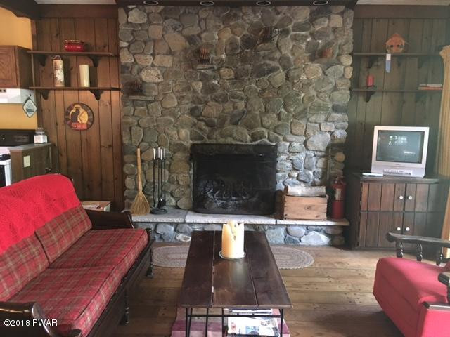 112 Colonia Road Milford, PA 18337 - Photo 3 of 16 Living Room with Stone Fire Place