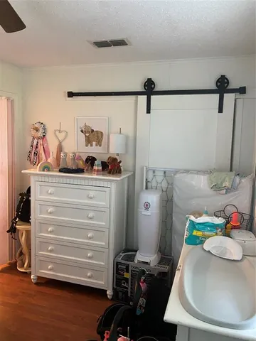 a bathroom with a sink a vanity and a mirror