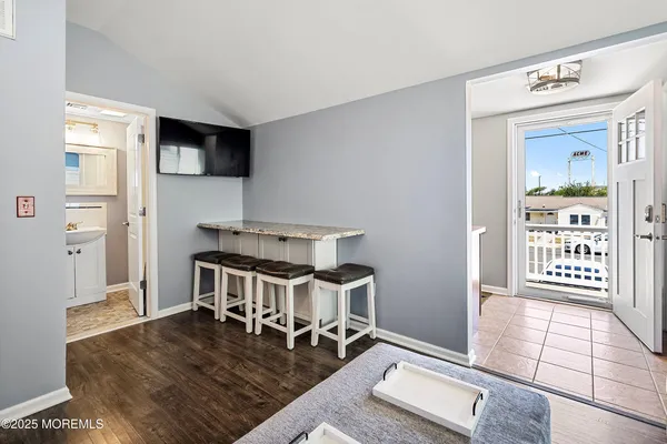 a living room with furniture and a table