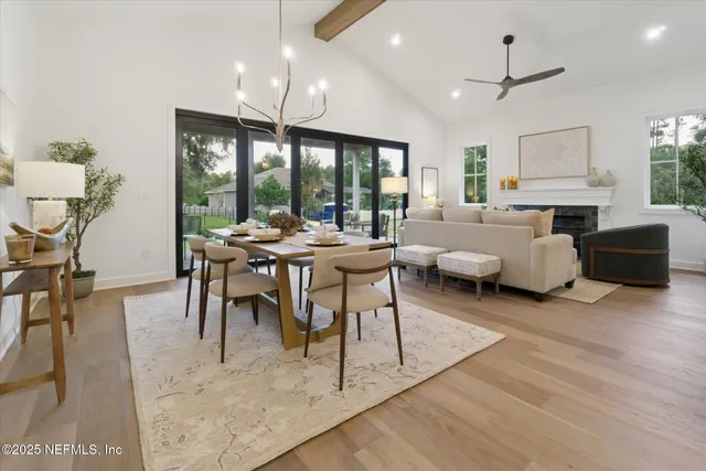 a view of a dining room with furniture window and outside view