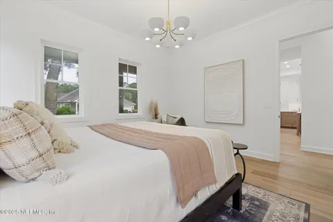 a bathroom with a granite countertop sink mirror and a