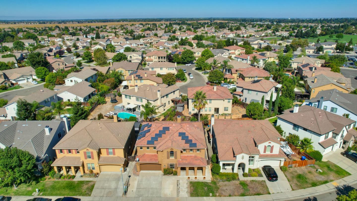 9987 Spring View Way Elk Grove, CA 95757 - Photo 3 of 28 an aerial view of a houses with outdoor space and street view