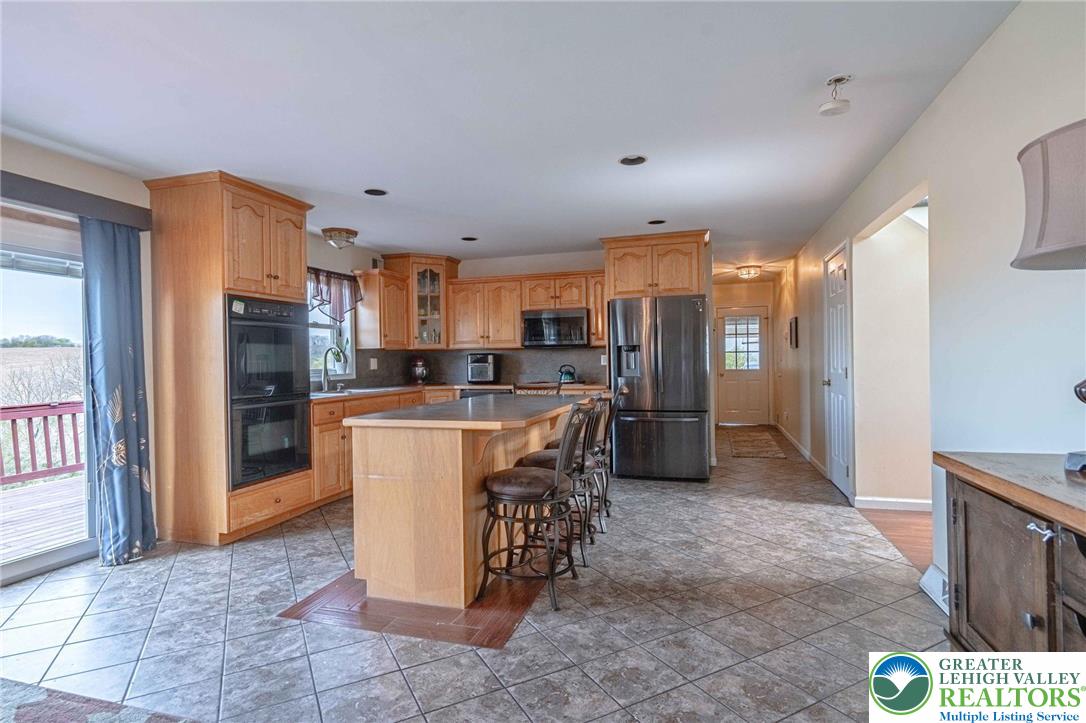 2475 Spring Street Coplay, PA 18037 - Photo 6 of 42 Kitchen into hallway towards mudroom and garage