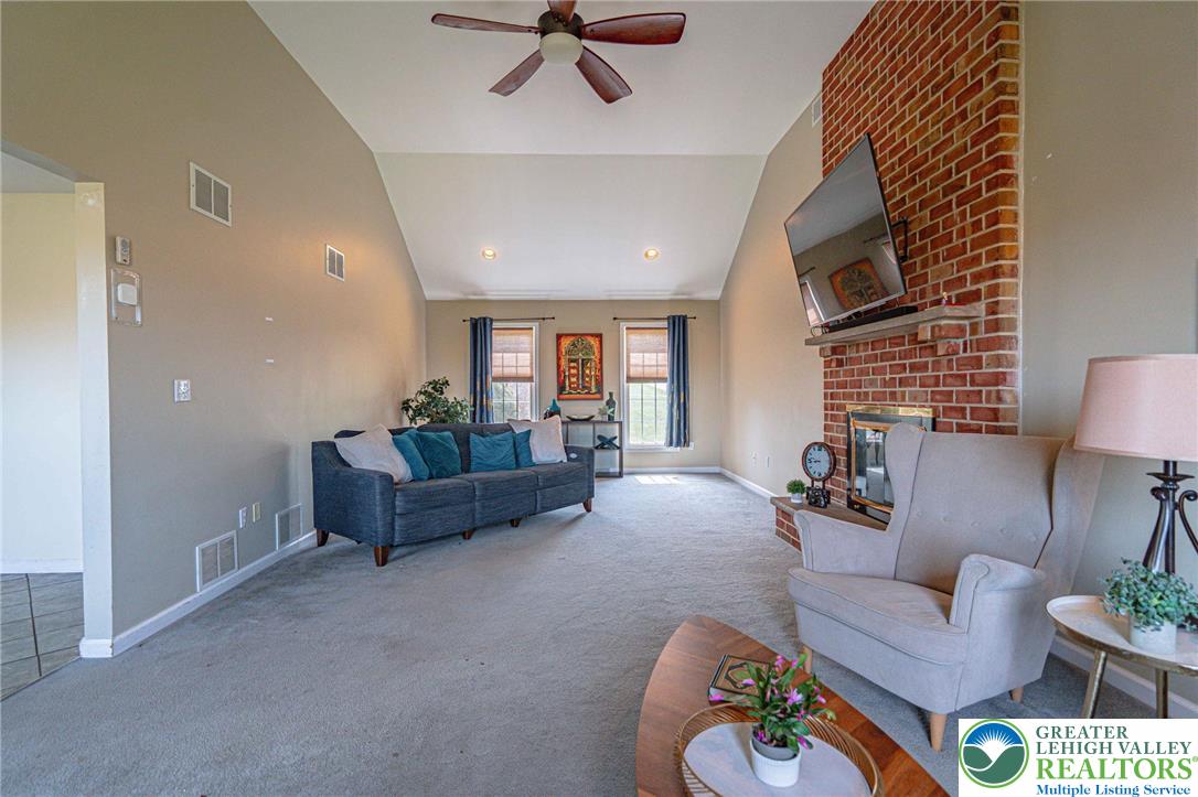 2475 Spring Street Coplay, PA 18037 - Photo 9 of 42 Family room with cathedral ceilings