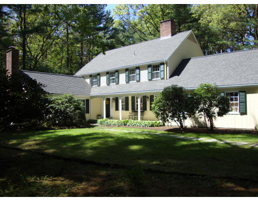 34 Decatur Lane Wayland, MA 01778 - Photo 1 of 1 a front view of a house with a garden