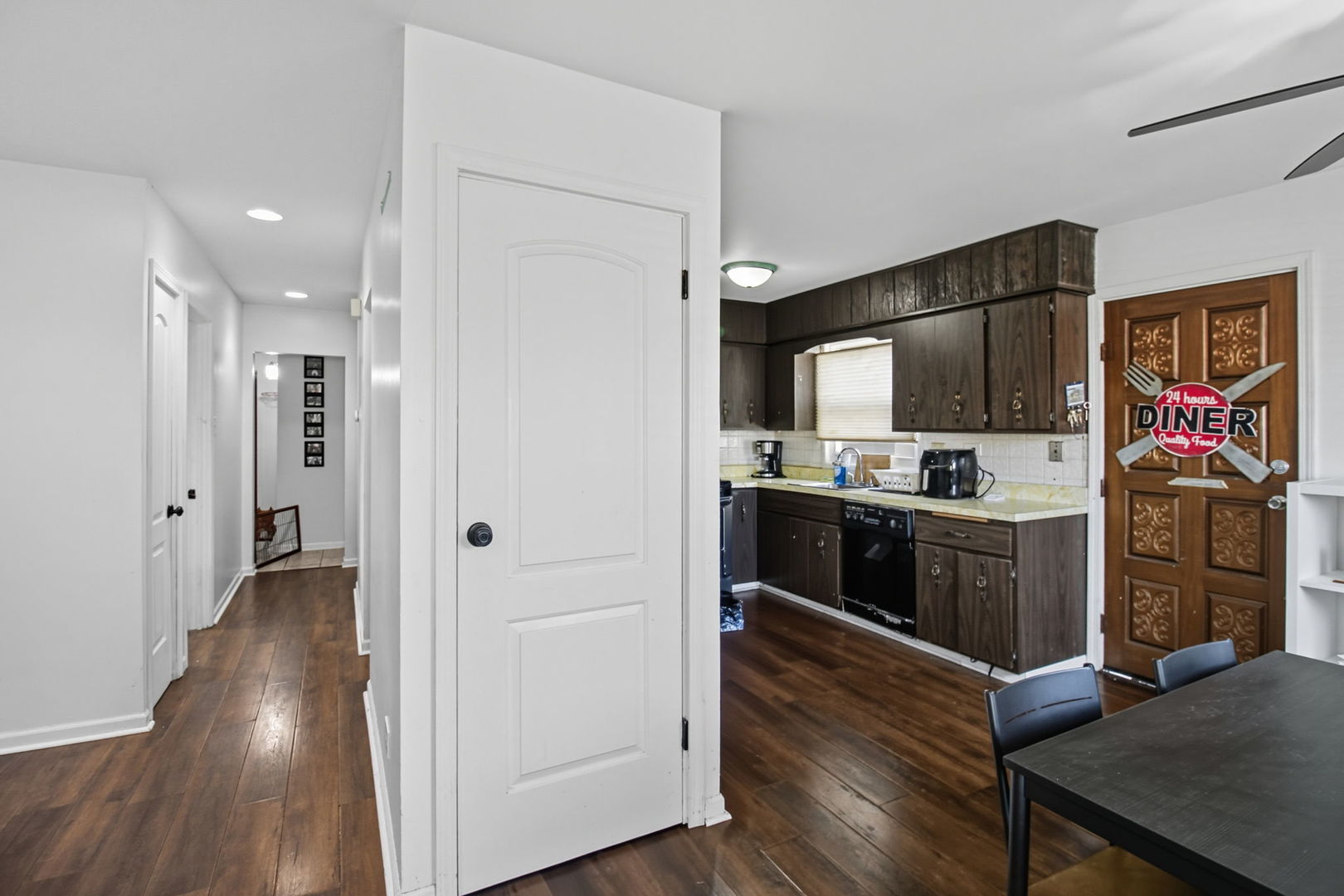 6611 West 83rd Street Burbank, IL 60459 - Photo 6 of 29 a kitchen with stainless steel appliances kitchen island granite countertop a refrigerator and a stove top oven