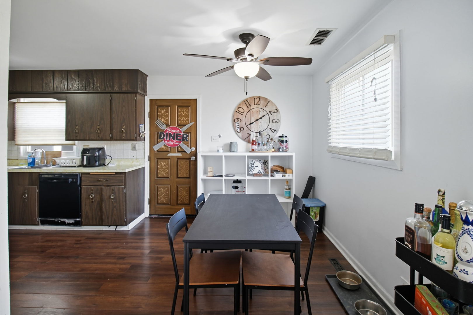 6611 West 83rd Street Burbank, IL 60459 - Photo 8 of 29 a view of a dining room with furniture and wooden floor