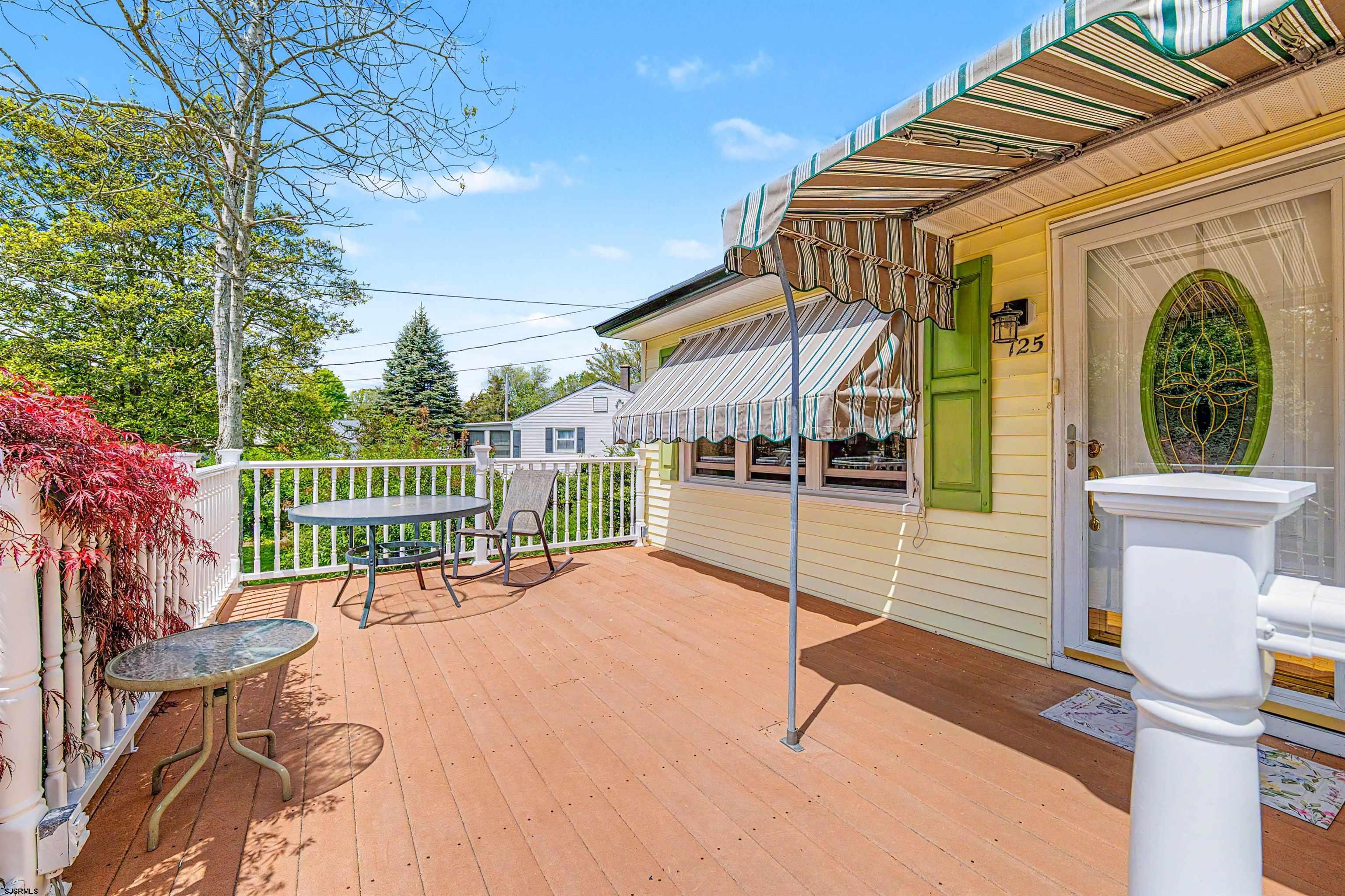 125 Exton Road Somers Point, NJ 08244 - Photo 5 of 35 a view of a terrace with chairs and a barbeque