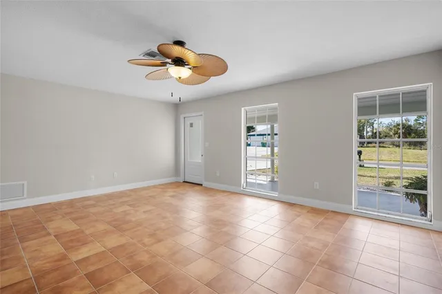 a kitchen with granite countertop a sink and a window