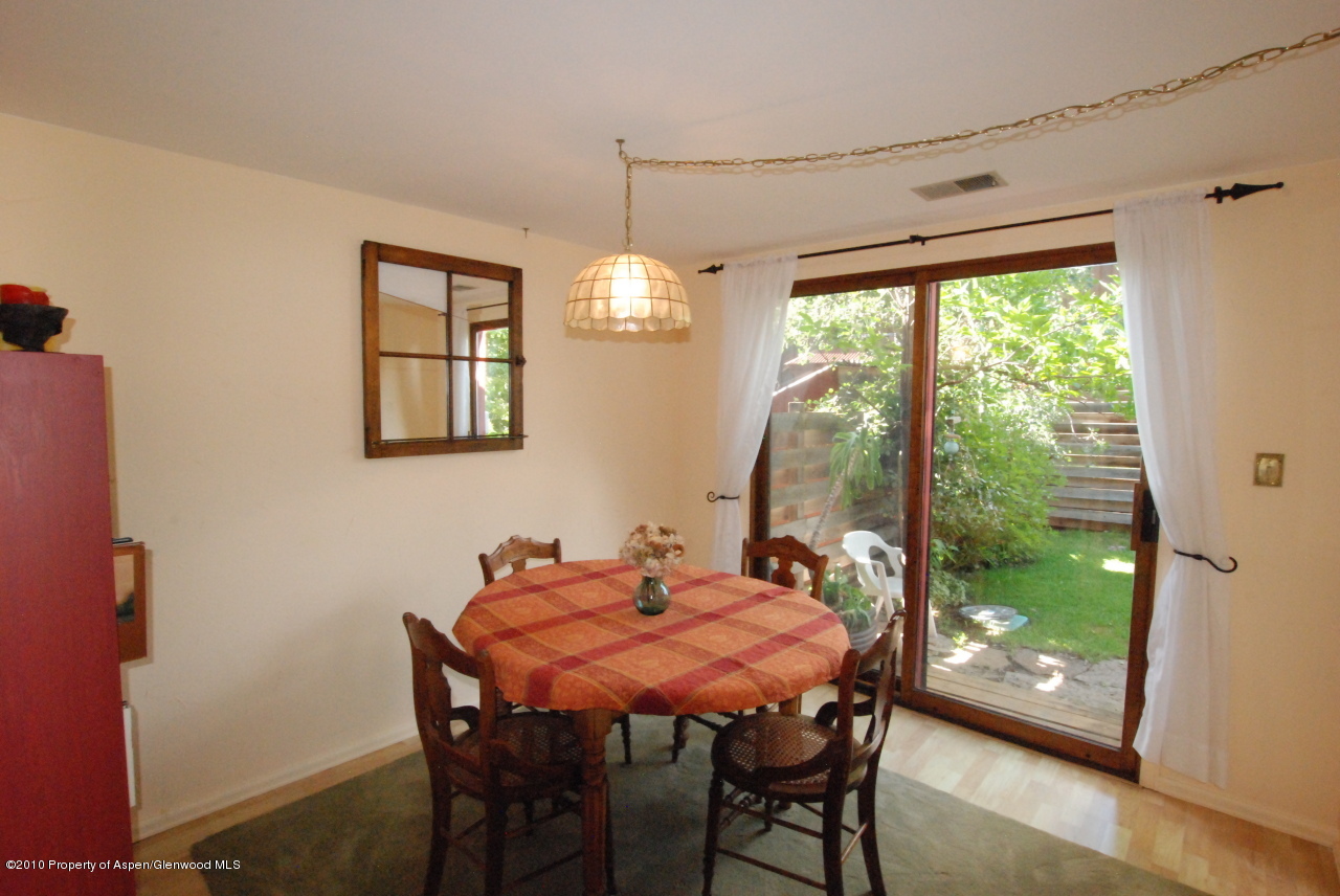40 B Riversedge Court Basalt, CO 81621 - Photo 5 of 11 a dining room with furniture window and outside view