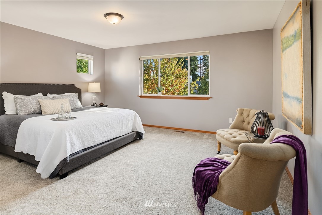 210 Hubbard Road, Unit 2 Lynnwood, WA 98036 - Photo 20 of 25 a bed sitting in a bedroom next to a window
