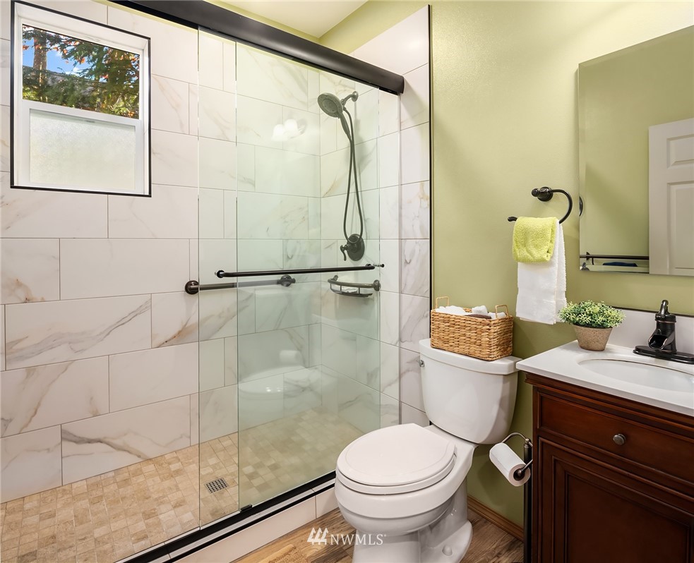 210 Hubbard Road, Unit 2 Lynnwood, WA 98036 - Photo 8 of 25 a bathroom with a sink toilet and shower