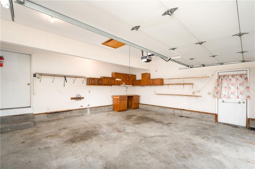 309 Quail Ridge Court Gibsonia, PA 15044 - Photo 37 of 48 Nice workbench area in back corner of the garage.