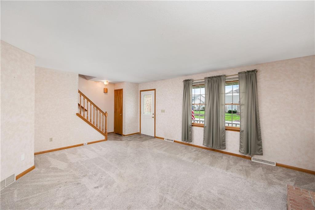 309 Quail Ridge Court Gibsonia, PA 15044 - Photo 6 of 48 Entry includes low maintenance LVP flooring & convenient coat closet, open to the spacious living room