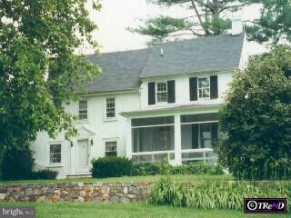105 Hess Mill Road Landenberg, PA 19350 - Photo 1 of 1 a front view of a house with a yard and garage