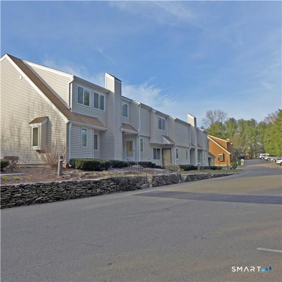11 MacIntosh Lane, Unit 11 Ansonia, CT 06401 - Photo 12 of 13 a street view with a street sign