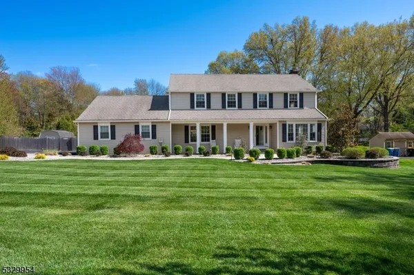 a view of a house with a big yard