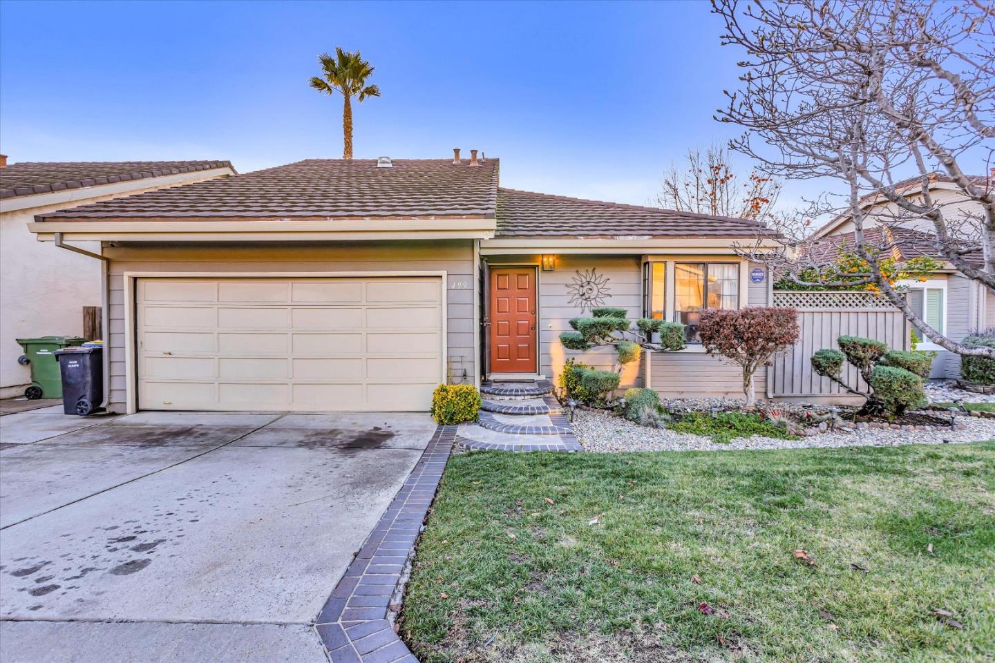 499 Bayview Park Drive Milpitas, CA 95035 - Photo 1 of 41 a front view of a house with garden