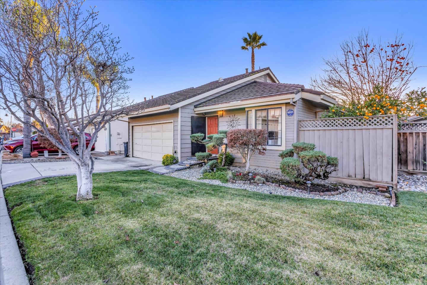 499 Bayview Park Drive Milpitas, CA 95035 - Photo 2 of 41 a front view of a house with garden