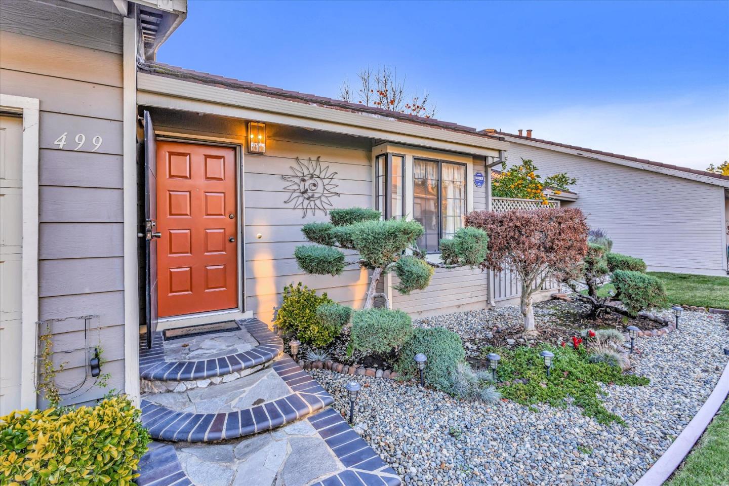 499 Bayview Park Drive Milpitas, CA 95035 - Photo 3 of 41 a front view of a house with garden